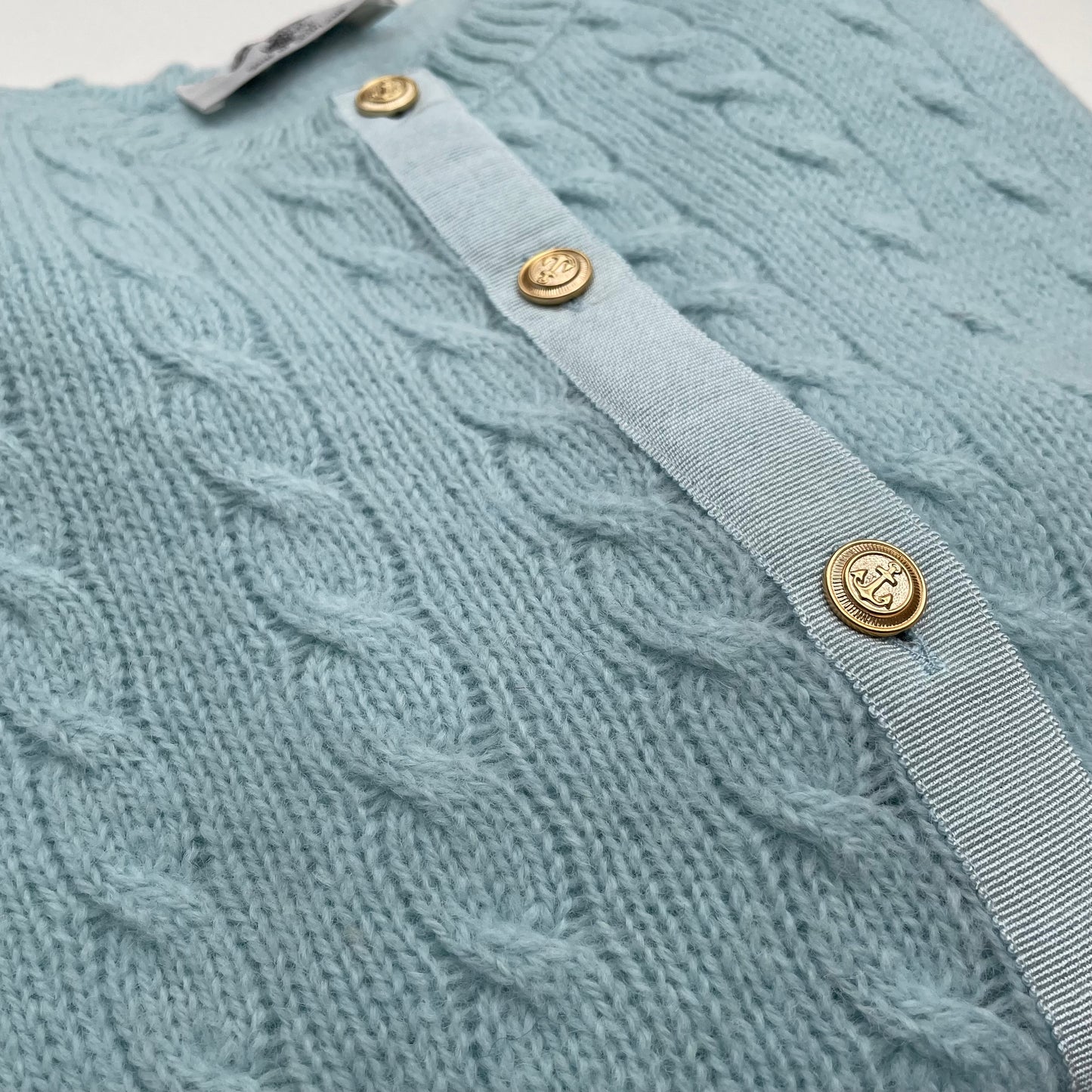 Cardigan azzurro baby lana shetland