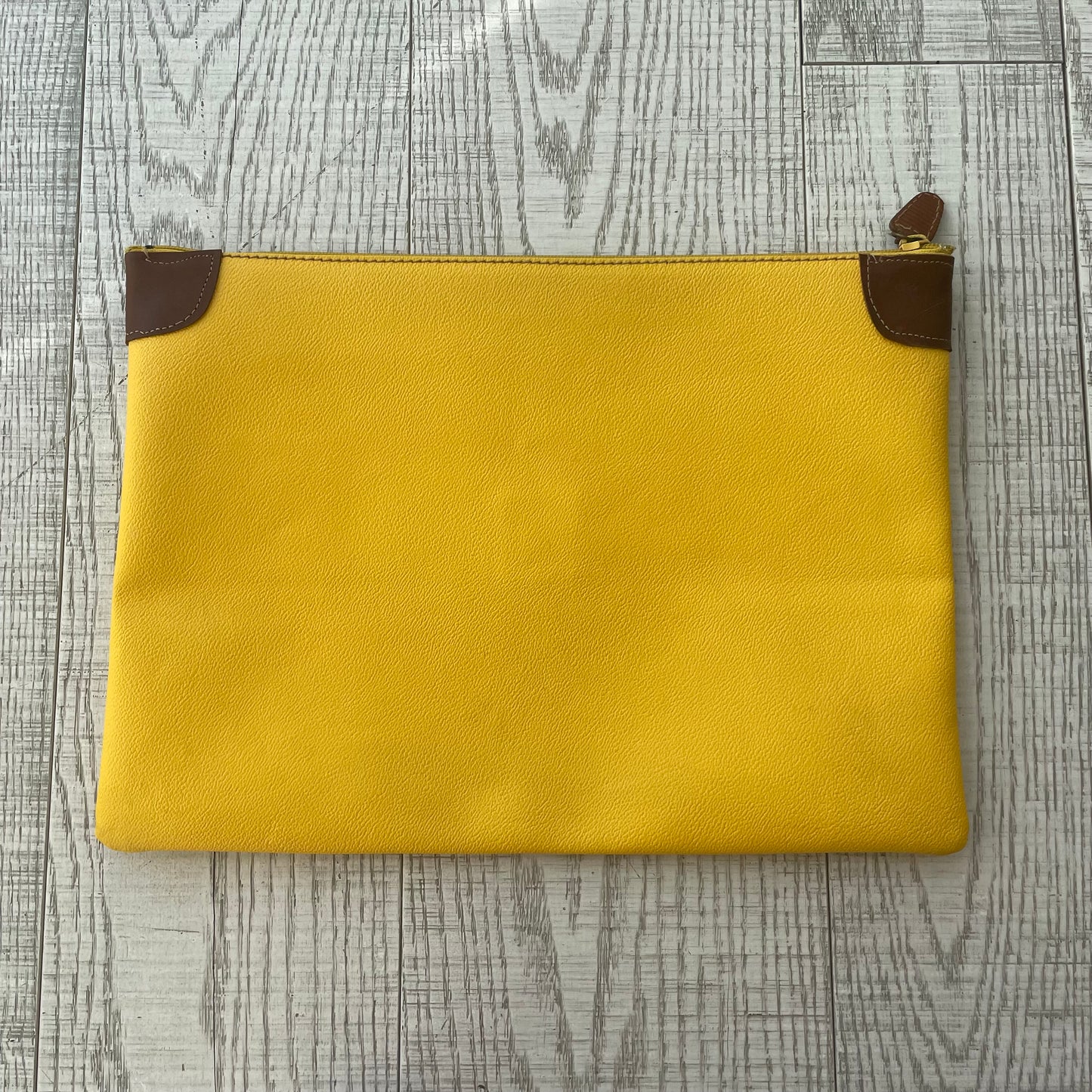 Yellow Trussardi envelope
