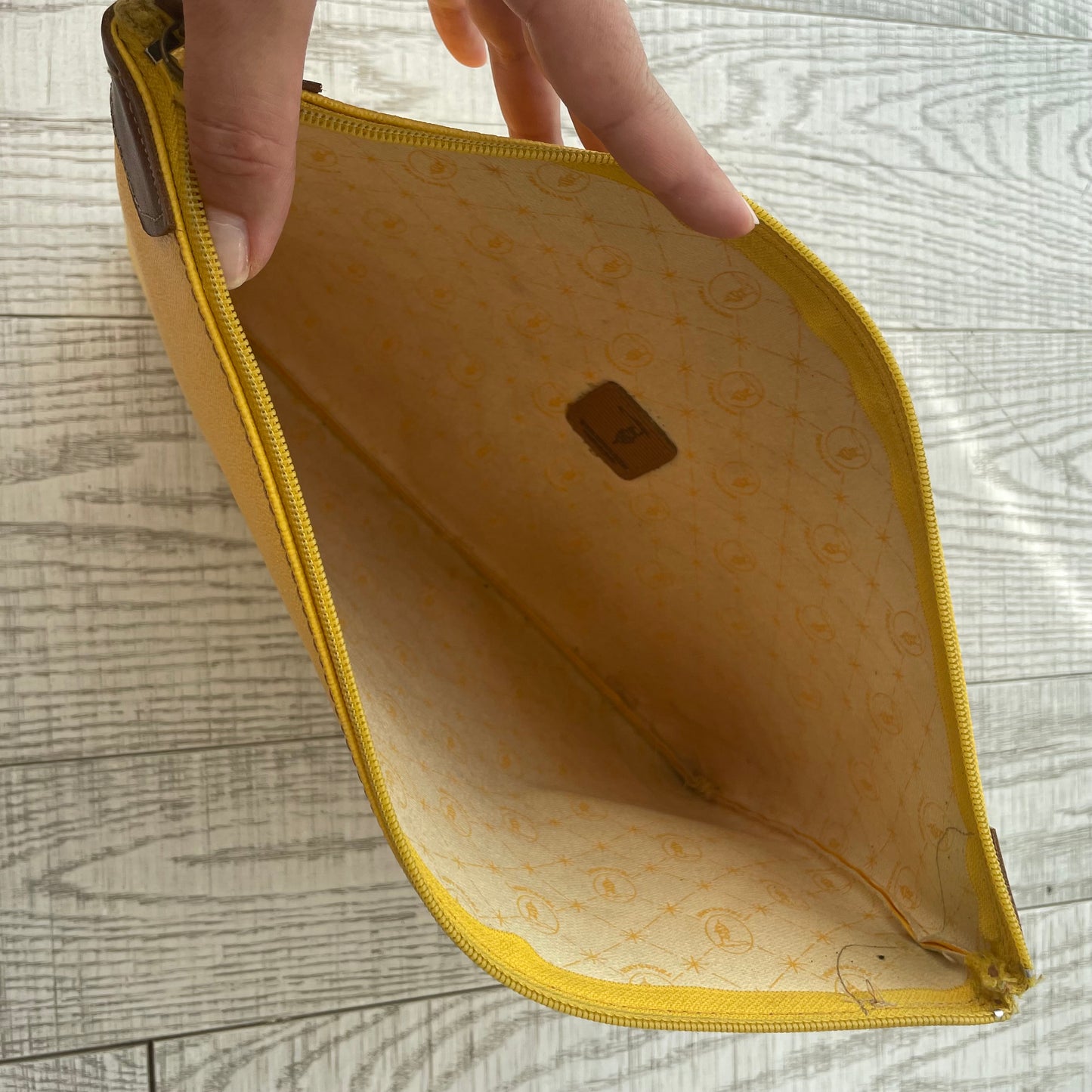 Yellow Trussardi envelope
