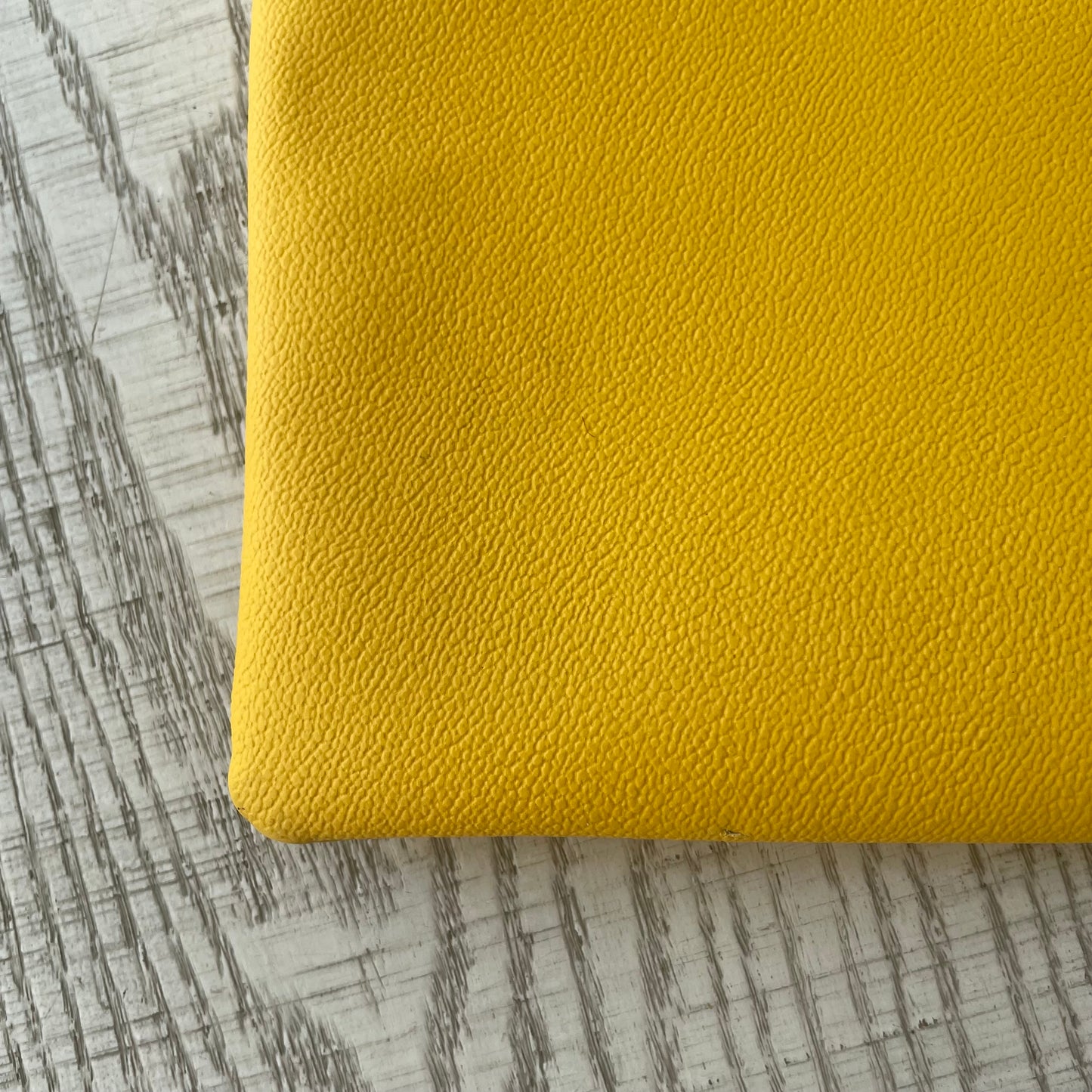 Yellow Trussardi envelope