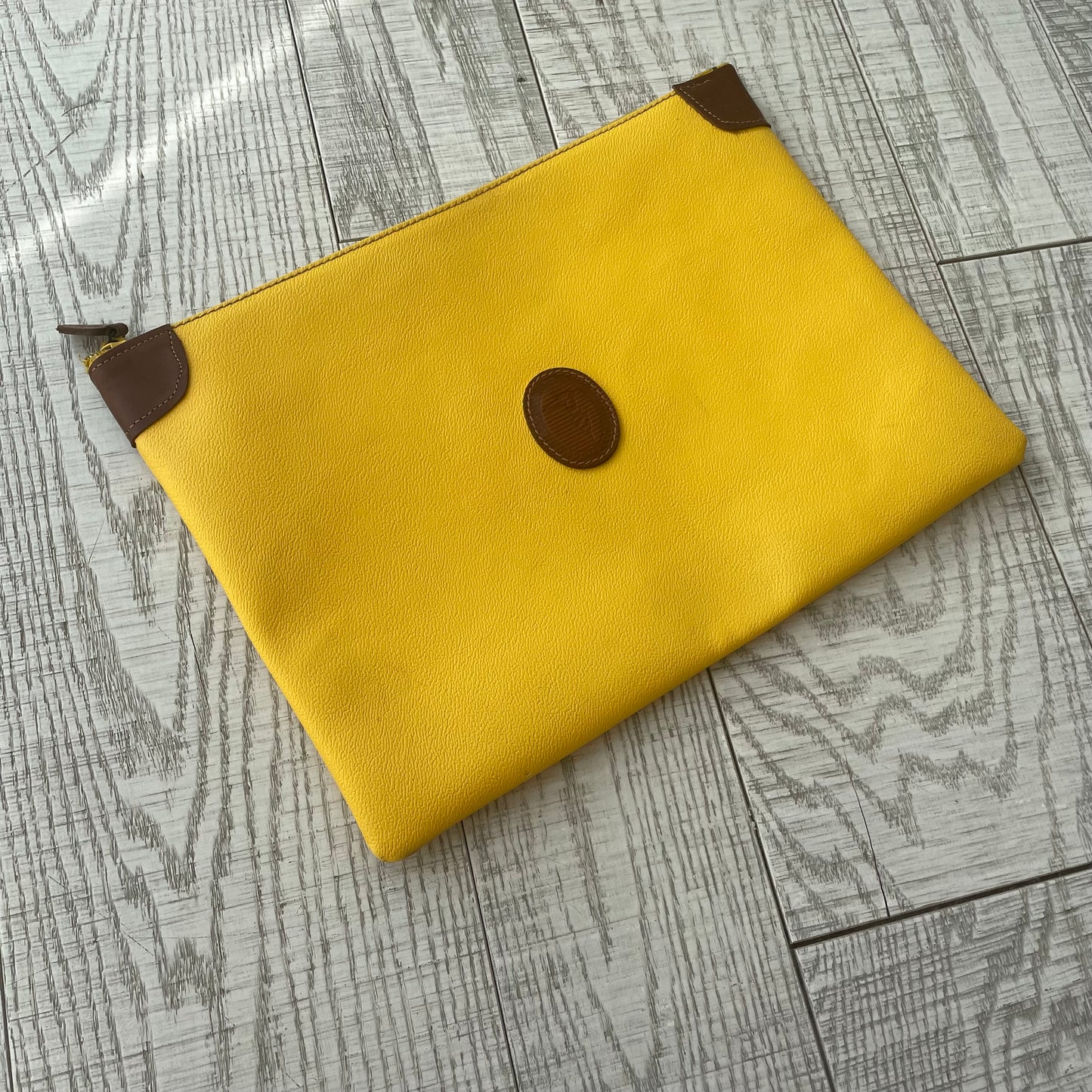 Yellow Trussardi envelope