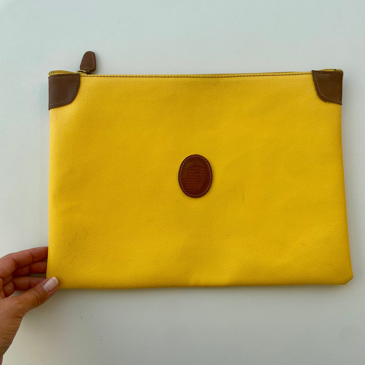 Yellow Trussardi envelope
