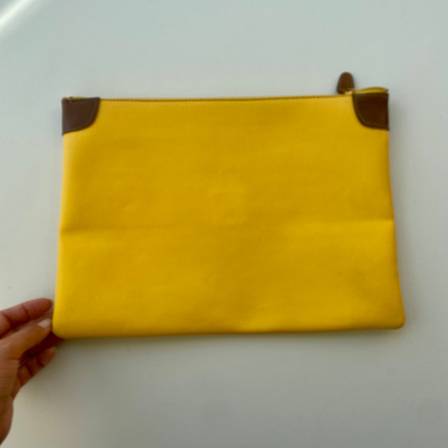 Yellow Trussardi envelope