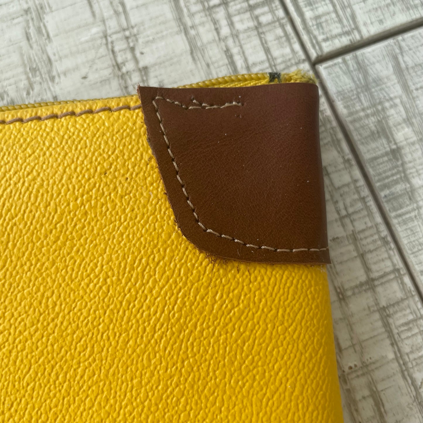 Yellow Trussardi envelope