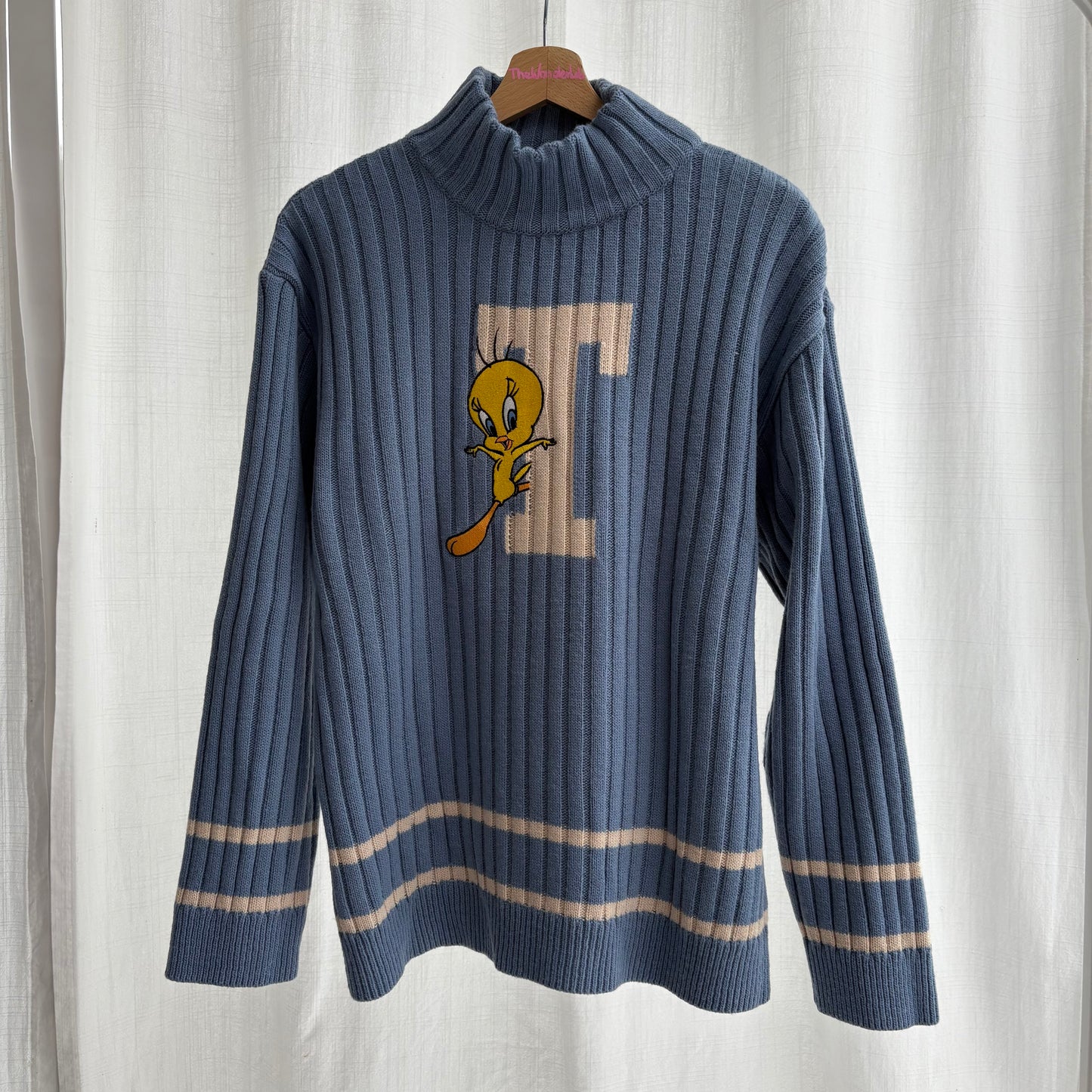 Titti pull azzurro a coste