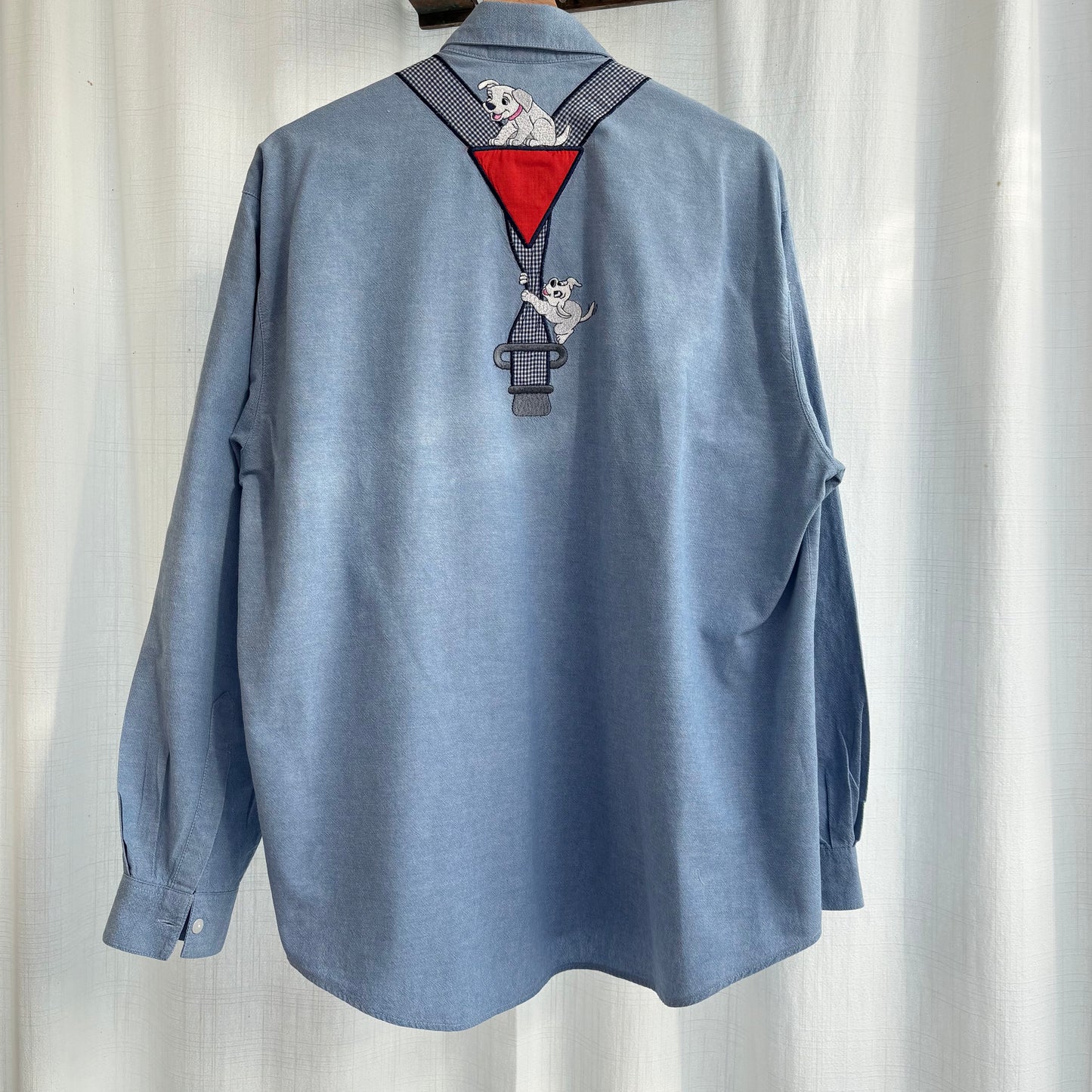 Camicia cuccioli su bretelle