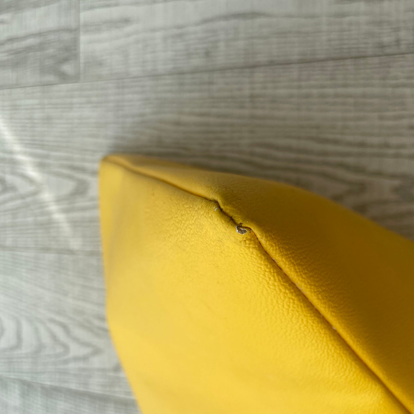 Yellow Trussardi envelope