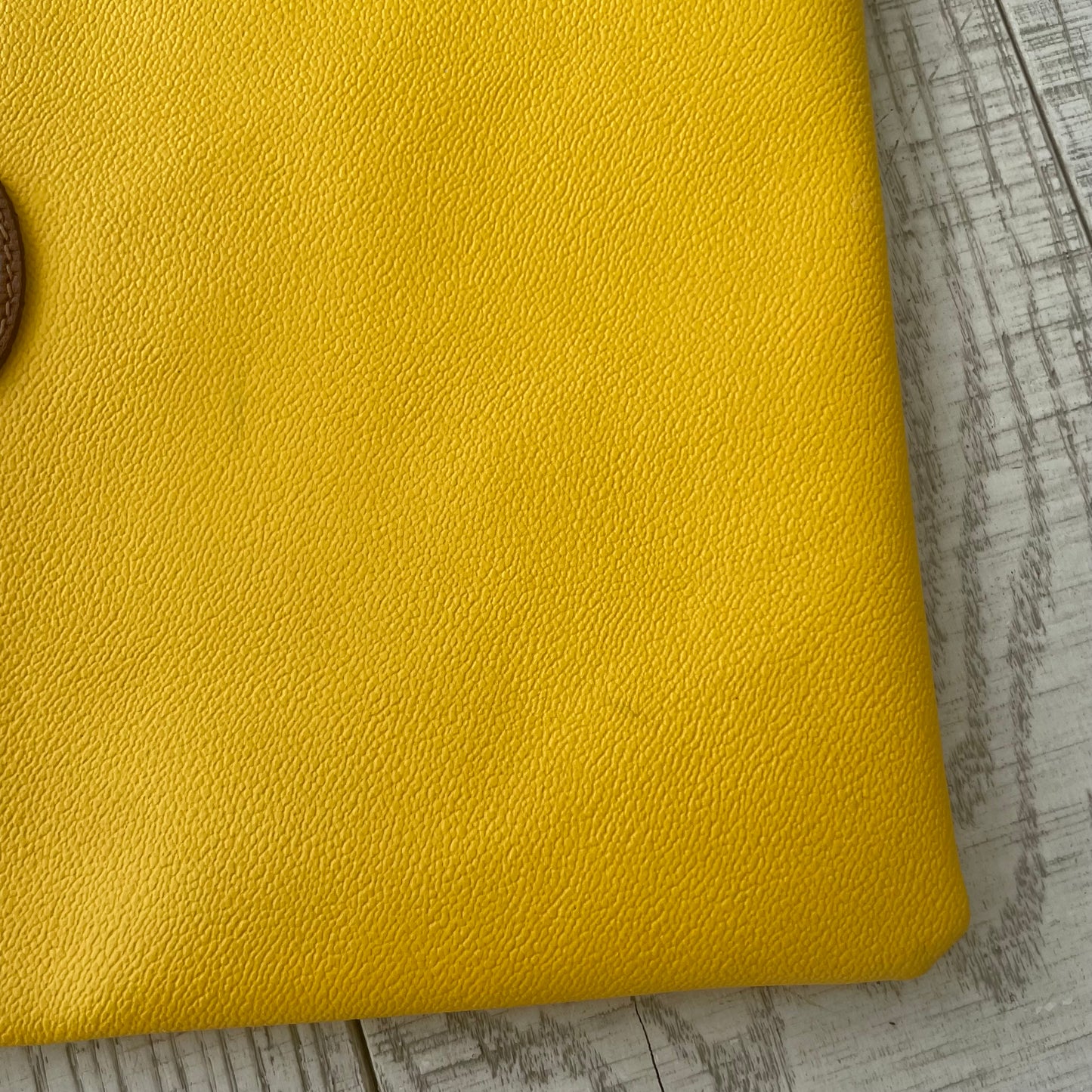 Yellow Trussardi envelope