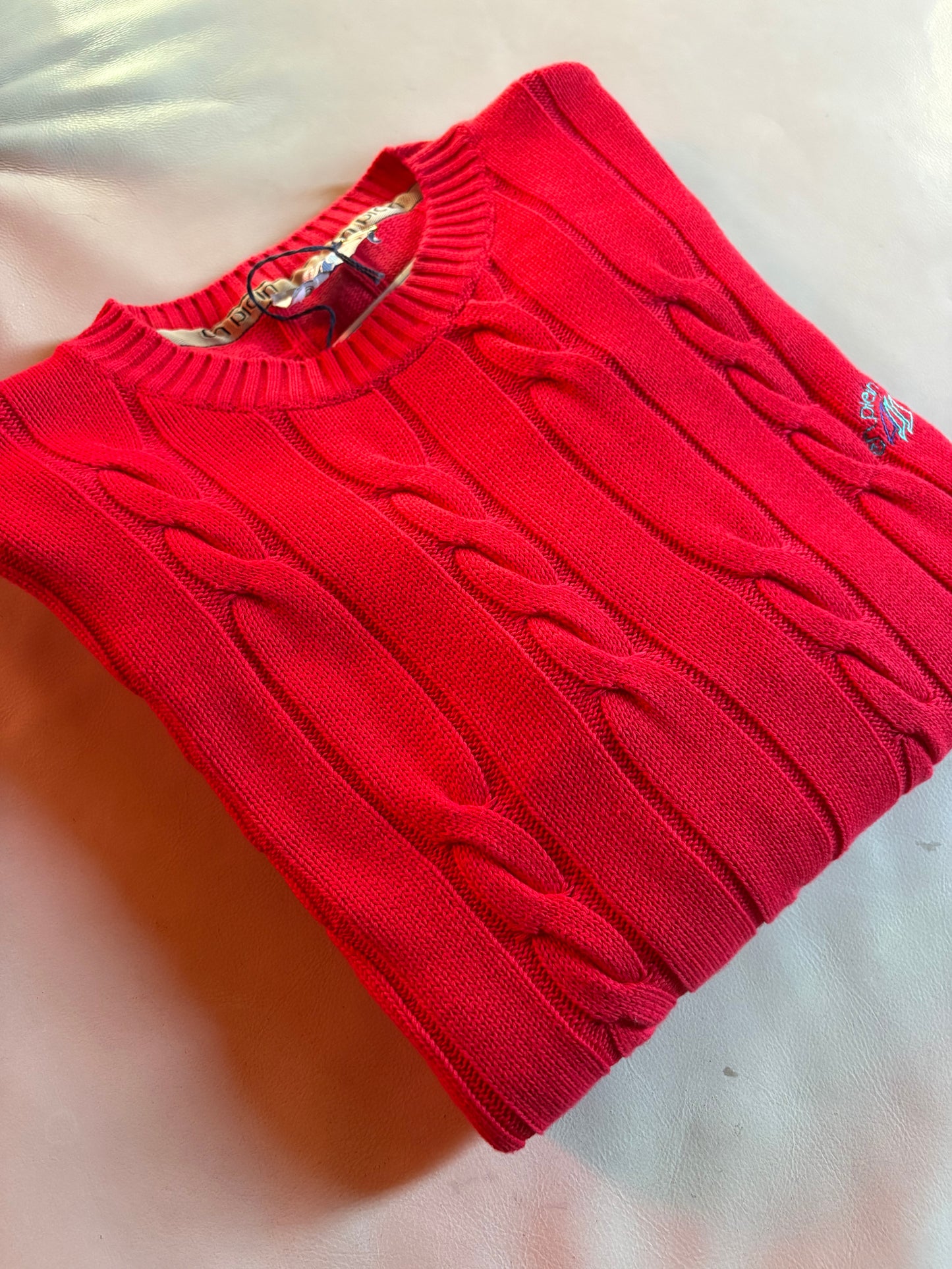 Pull girocollo a trecce