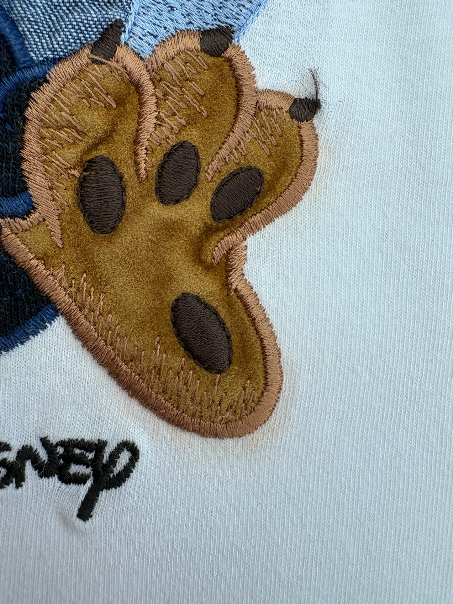 Ts Schvili con pluto e scollo barchetta