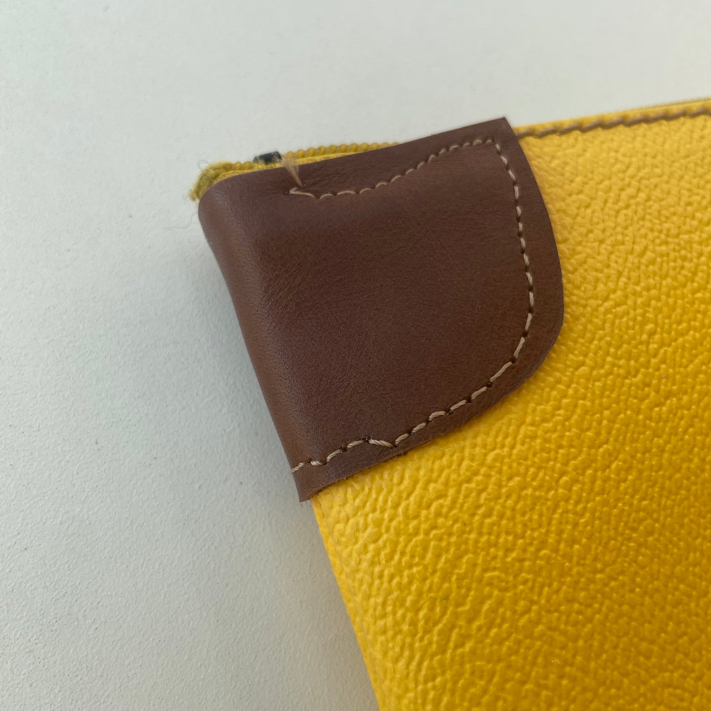 Yellow Trussardi envelope