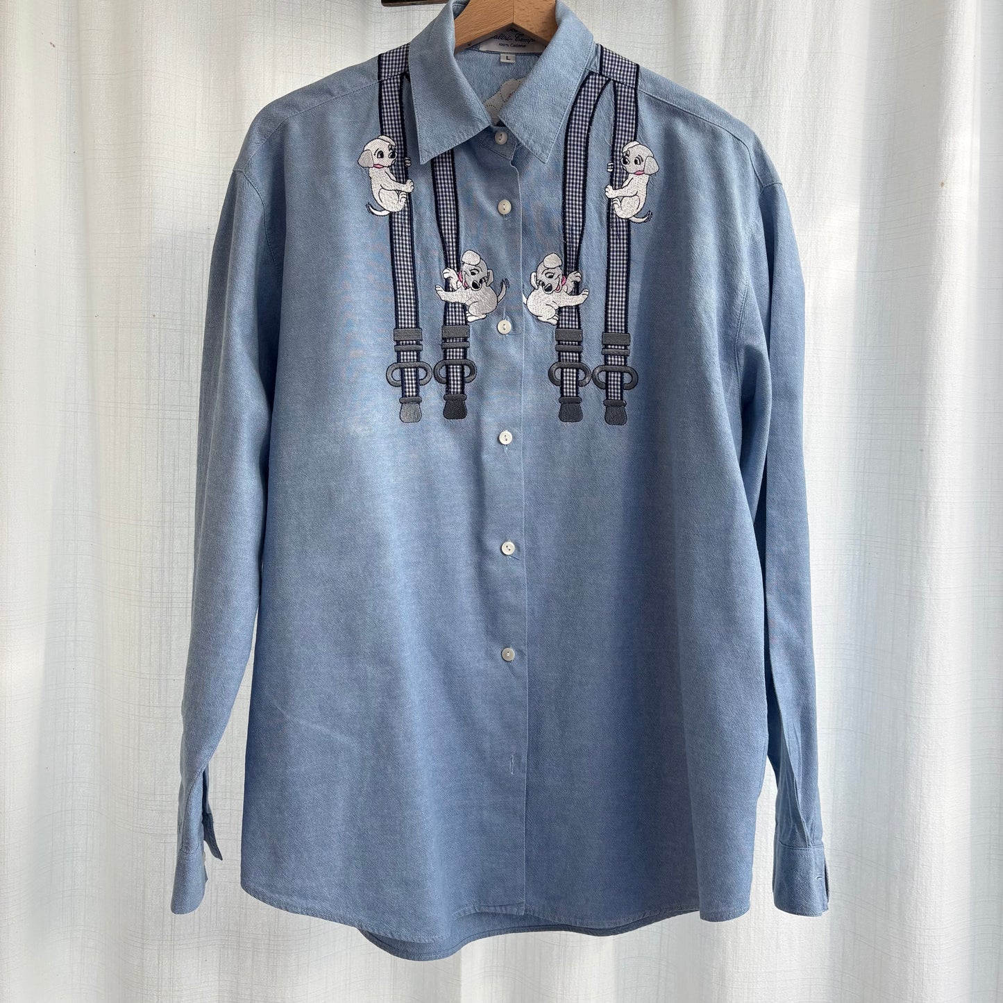 Camicia cuccioli su bretelle