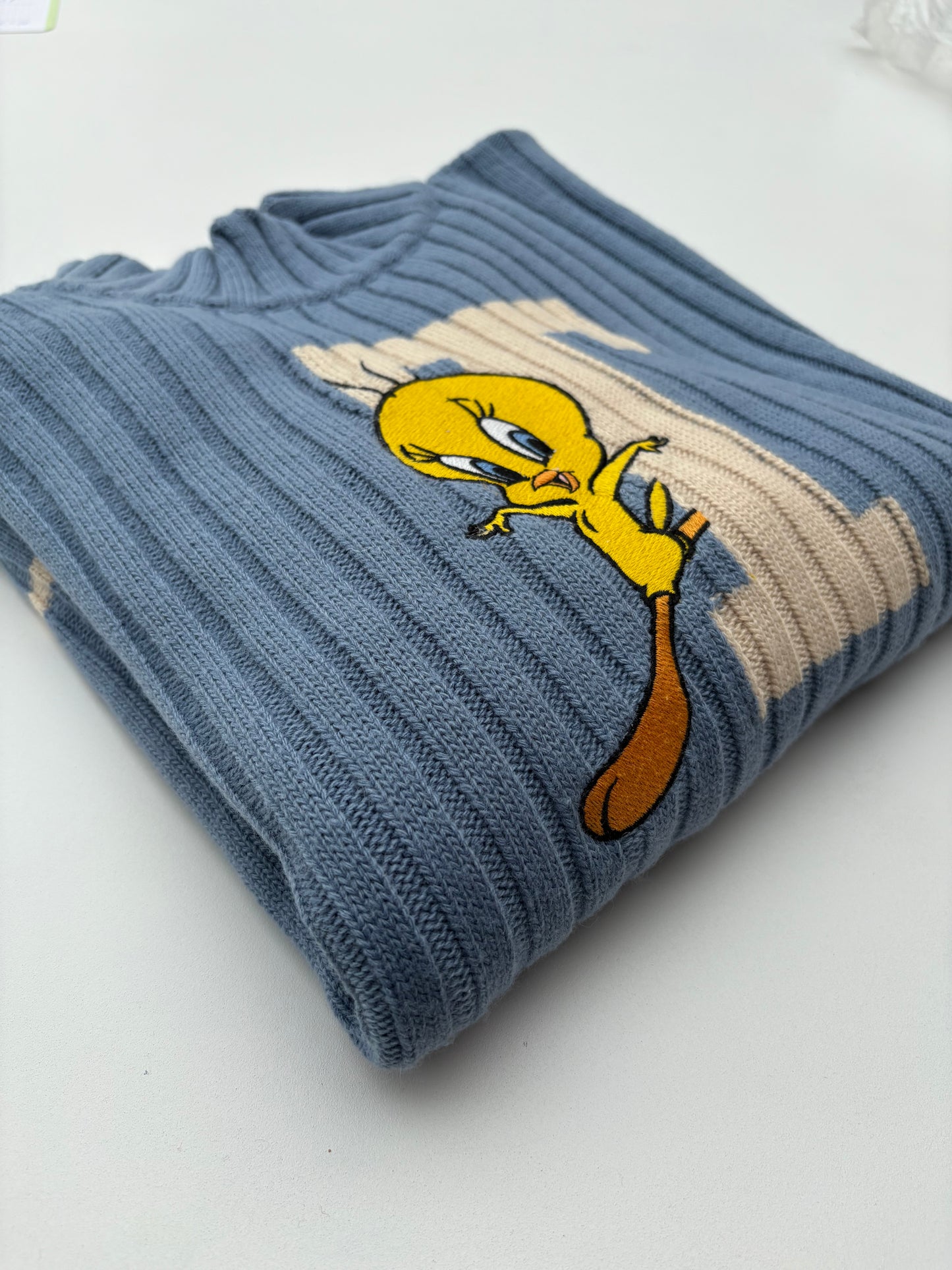 Titti pull azzurro a coste