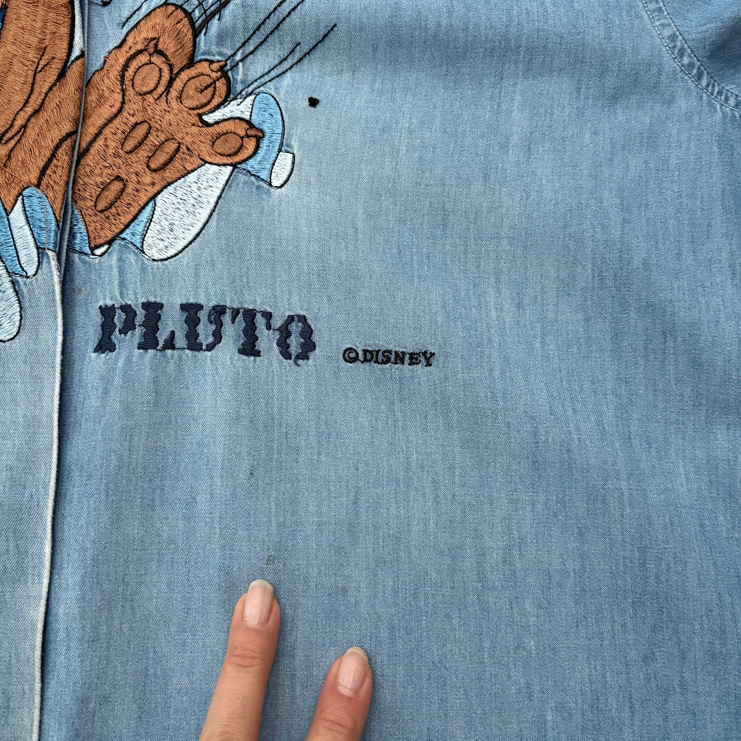 Pluto denim con difetti