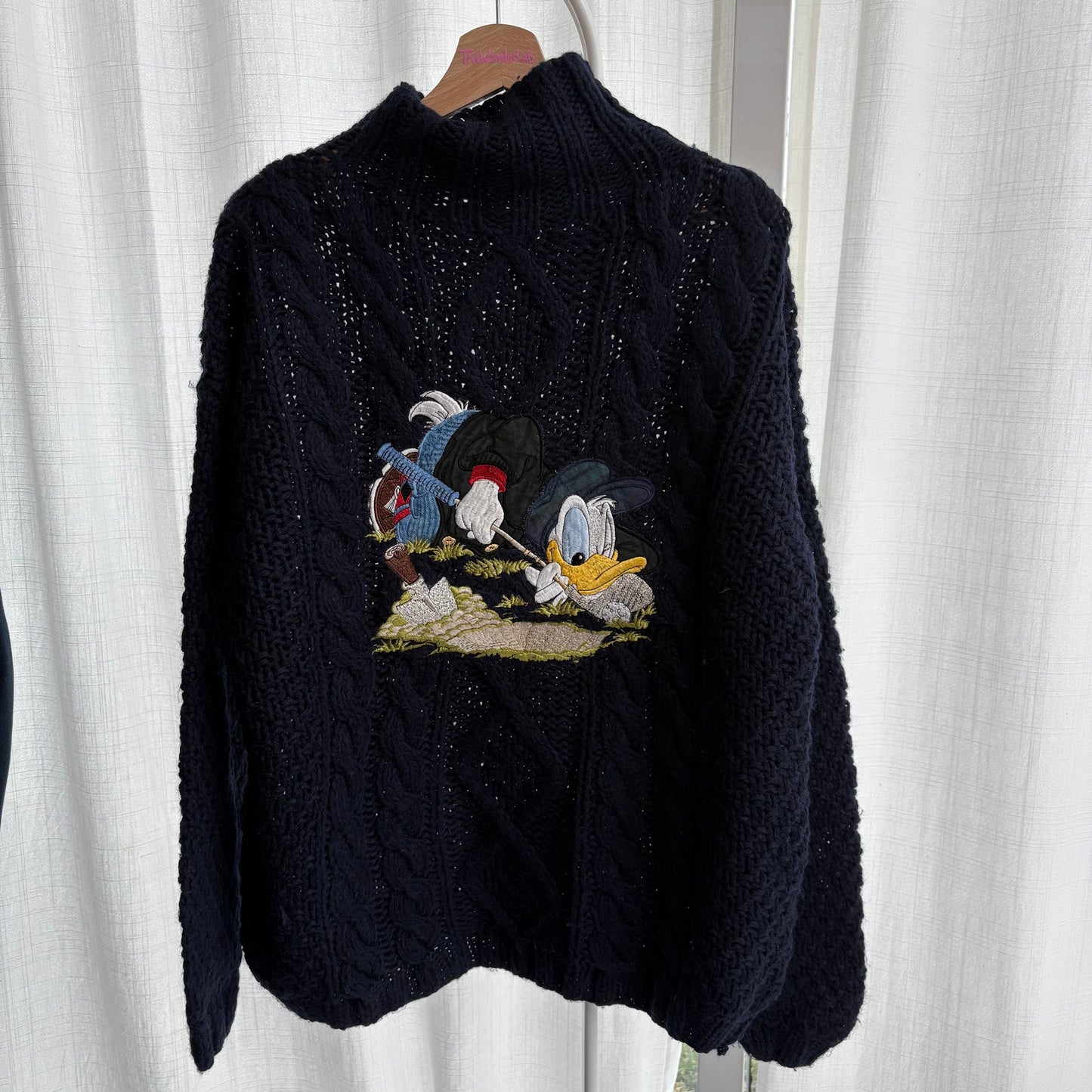 Paperino pullover collo alto