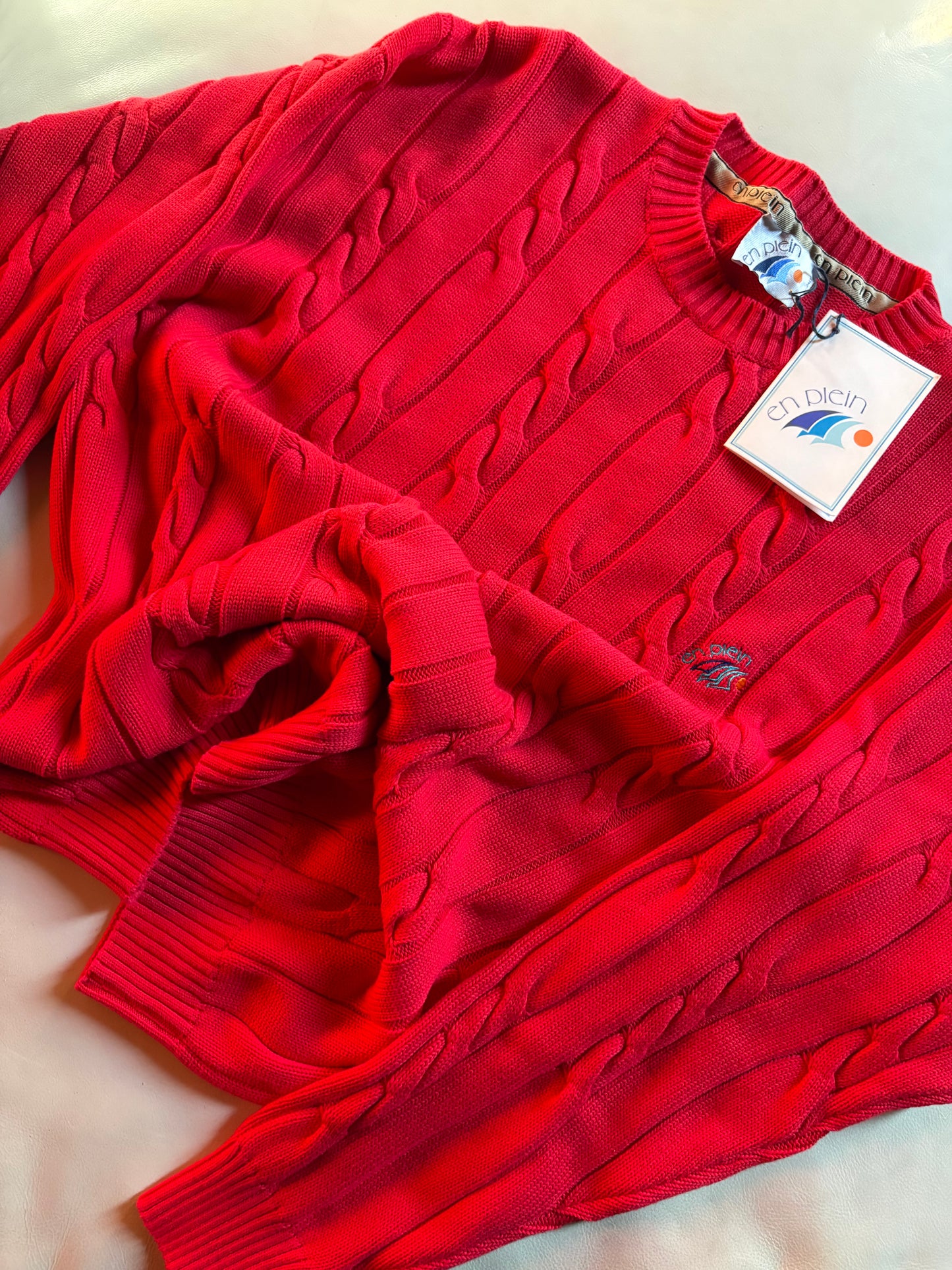 Pull girocollo a trecce