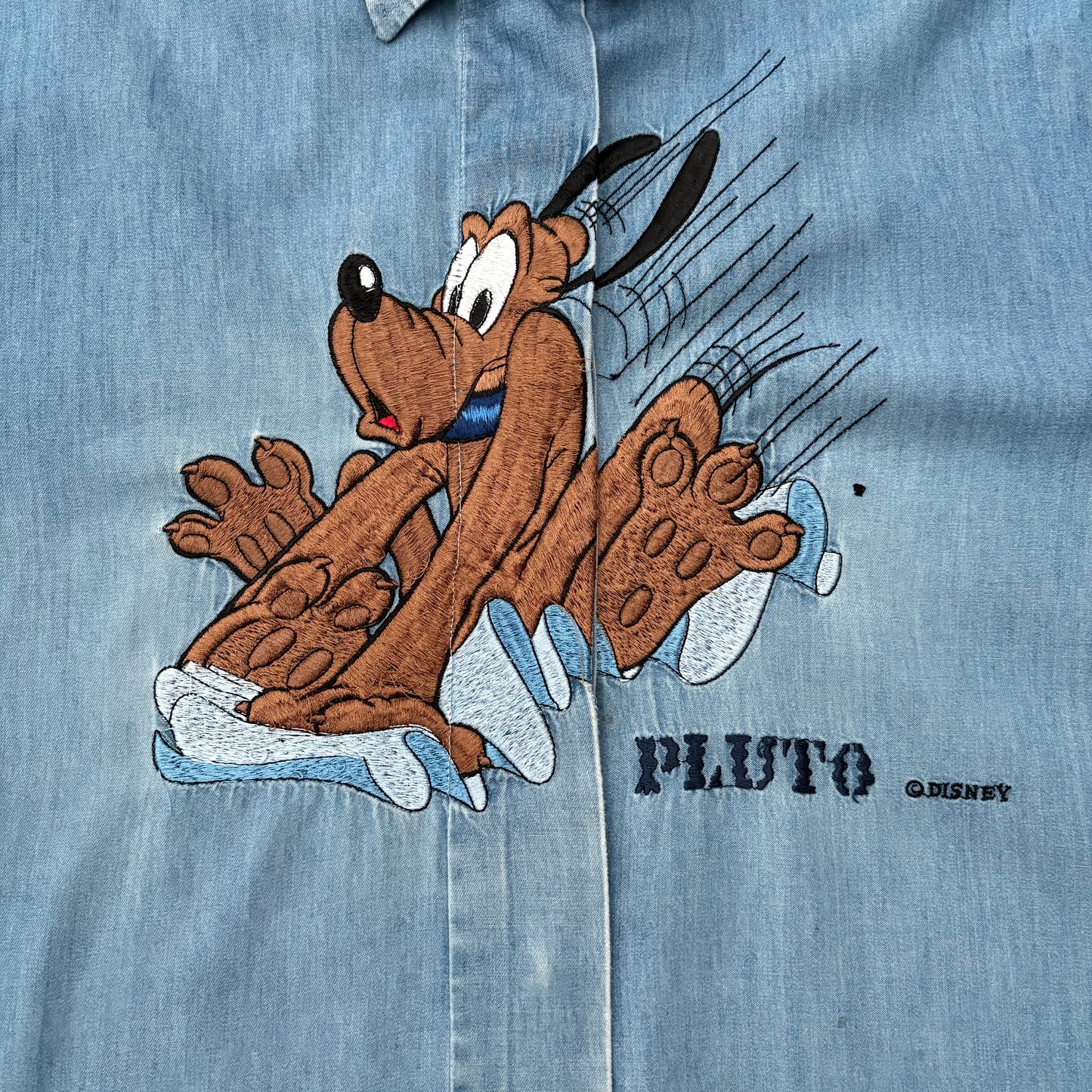 Pluto denim con difetti