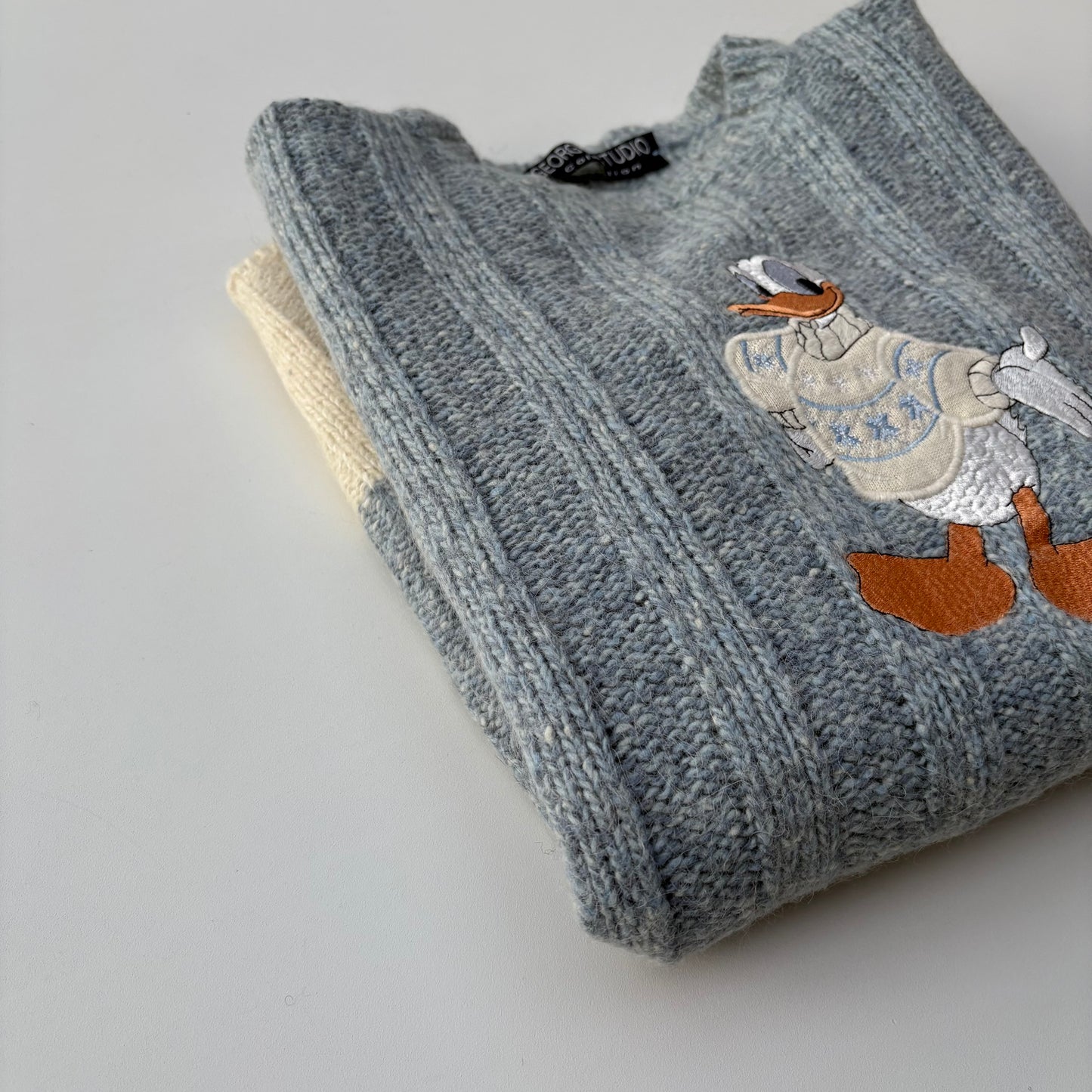 Paperino pullover bicolor